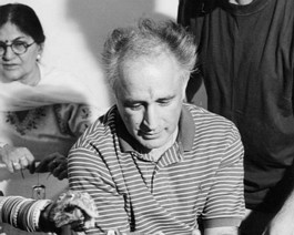 Shokee The picture depicts the eldest uncle Shokee inserting bangles on the brides wrist.