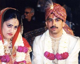 Couple-01 A portrait of the couple concentrating to catch the words of the priest.